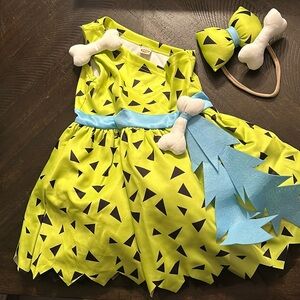 3T (100) pebbles costume with matching headband. Still with original tags